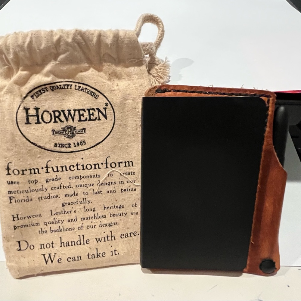 Beautiful hand stitched leather pocket sized note pad and/card holder with pen.